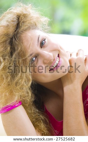 Portrait of happy young woman having good time