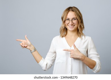 Portrait Happy Young Woman Pointing Fingers Stock Photo (Edit Now