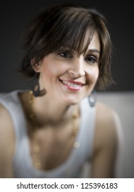 Portrait Of A Happy Young Woman With Shallow Depth Of Field