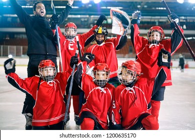 Portrait Of Happy Youth Boys Players Team Ice Hockey 
