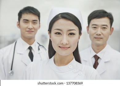 Portrait Of Healthcare Workers In China, Two Doctors And Nurse