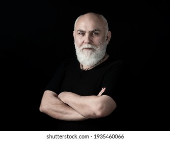 Portrait Of Healthy Happy Senior Elderly Caucasian Old Man Face With Arm Crossed Isolated On Black. Golden Age Grand Father, Healthcare Cheerful Lifestyle, Freedom Relax Retirement Concept