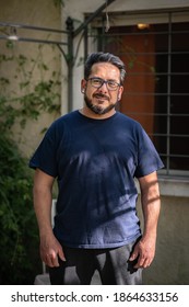 Portrait Of Healthy Latino Man Living With HIV Standing Outside Of His Home In Uruguay