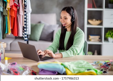 Portrait of her she beautiful cheerful girl retail store owner manager consultant chatting client talking on phone trendy boutique trade show room showroom sale things home-based office indoor