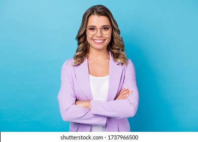 Portrait of her she nice attractive lovely successful cheerful cheery wavy-haired girl folded arms isolated over bright vivid shine vibrant blue color background - Powered by Shutterstock