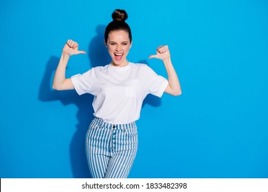 Portrait of her she nice attractive lovely pretty content cheerful cheery glad girl pointing at herself cool good choice isolated over bright vivid sine vibrant blue color background