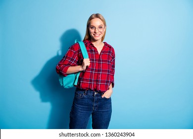 Portrait of her she nice lovely charming cute attractive winsome nerd content cheerful teen girl wearing checked shirt back to school isolated on teal turquoise bright vivid shine background - Powered by Shutterstock