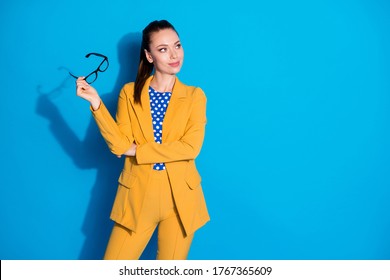 Portrait of her she nice-looking attractive lovely pretty classy chic lady holding in hands specs overthinking career growth development isolated bright vivid shine vibrant blue color background