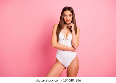Portrait of her she nice-looking attractive chic lovely lovable winsome sweet sporty content straight-haired lady in one-piece suit isolated over pink pastel background