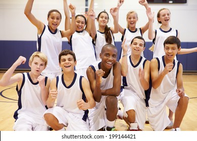 Portrait Of High School Sports Team In Gym