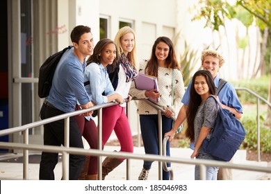 Portrait Of High School Students Standing Outside Building