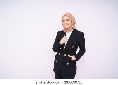 Portrait of hijab girl smiling. Pretty muslim girl. Beautiful asian muslim woman model in formal office attire posing over white background studio.