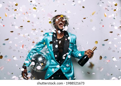 Portrait Of An Hip Hop Music Musician. Cinematic Image Of A Man Under Confetti Drop