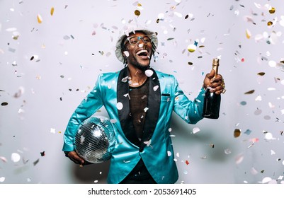 Portrait Of An Hip Hop Music Musician. Cinematic Image Of A Man Under Confetti Drop