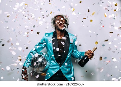 Portrait Of An Hip Hop Music Musician. Cinematic Image Of A Man Under Confetti Drop