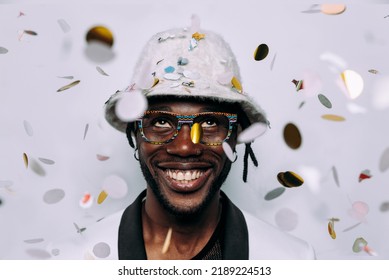 Portrait Of An Hip Hop Music Musician. Cinematic Image Of A Man Under Confetti Drop