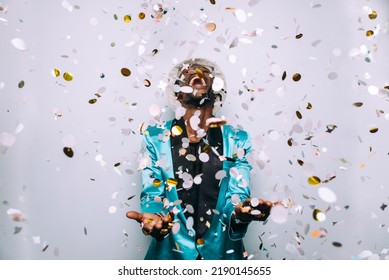 Portrait Of An Hip Hop Music Musician. Cinematic Image Of A Man Under Confetti Drop