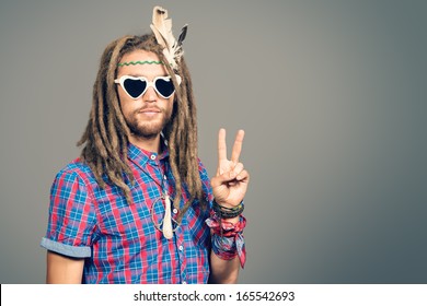 Portrait Of A Hippie Young Man In Spectacles.