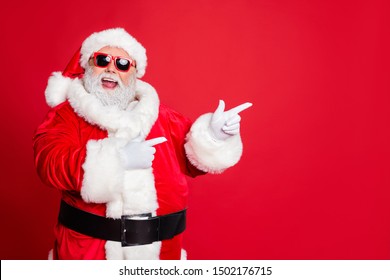 Portrait of his he cheerful cheery funky fat overweight plump gray-haired bearded man pointing choose choice decision gift present surprise isolated over bright vivid shine red background - Powered by Shutterstock