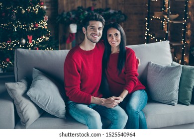 Portrait of his he her she nice attractive lovely charming sweet adorable gentle cheerful cheery married spouses sitting on divan holding hands in decorated loft industrial style interior - Shutterstock ID 1525540964