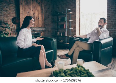 Portrait of his he her she nice attractive stylish cheerful people meeting, discussing consulting life coaching strategy plan at modern industrial loft style interior work place station indoors