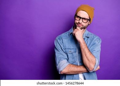 Portrait of his he nice attractive doubtful bearded guy touching chin thinking guessing strategy copy space isolated over bright vivid shine violet lilac purple background