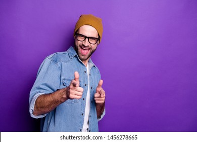 Portrait of his he nice attractive confident content cool cheerful cheery glad bearded guy pointing two forefingers at you flirting isolated over bright vivid shine violet lilac background