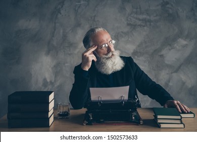 Portrait of his he nice attractive bearded bewildered gray-haired professional expert creative publisher inspiration imagination genius idea solution deciding over concrete wall background - Shutterstock ID 1502573633