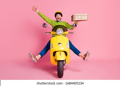 Portrait of his he nice attractive funky ecstatic overjoyed crazy cheerful cheery guy driving moped fooling having fun bringing pizza pie isolated over pink pastel color background