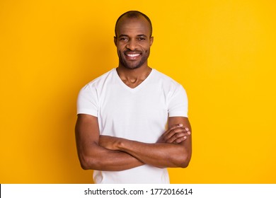 Portrait Of His He Nice Attractive Sportive Cheerful Cheery Content Guy Personal Trainer Folded Arms Isolated Over Bright Vivid Shine Vibrant Yellow Color Background