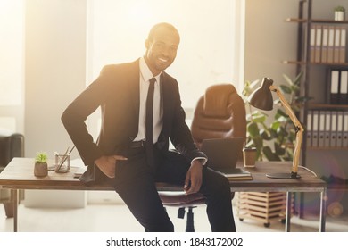 Portrait Of His He Nice Attractive Trendy Elegant Content Successful Cheerful Cheery Director Ceo Boss Chief Employer Real State Agent Broker Lawyer Financier Sitting On Table At Work Place Station