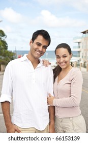 Portrait Of A Hispanic Couple In Love Outdoors