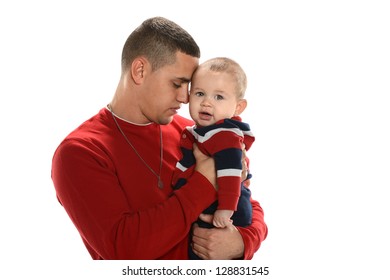 Portrait Of Hispanic Father And Son Isolated Over White Background