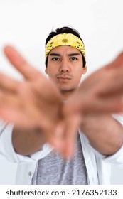 Portrait Of Hispanic Man Wearing Yellow Bandana