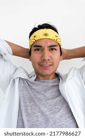 Portrait Of Hispanic Man Wearing Yellow Bandana