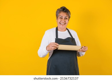 Portrait Of Hispanic Mature Senior Woman Baker Chef Middle Aged Cooking In Mexico Latin America
