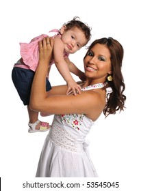 Portrait Of Hispanic Mother Holding Daughter Isolated Over White Background