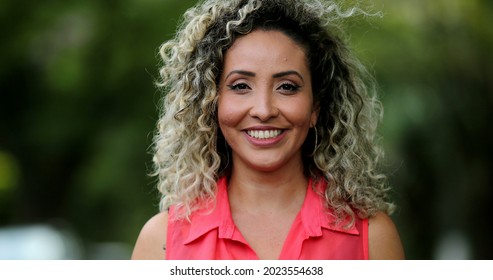 Portrait Hispanic Woman Smiling Outside At Park, Casual Real People