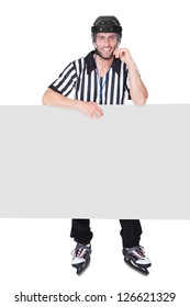 Portrait of hockey judge presenting empty banner. Isolated on white