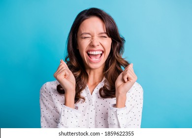 Portrait of hooray nice brunette girl hands fists wear shirt isolated on teal color background - Shutterstock ID 1859622355