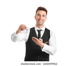 Portrait Of Hotel Receptionist With Room Keys On White Background