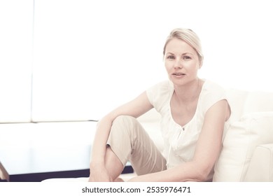 Portrait, house and woman on couch, relax and comfortable with weekend break in living room. Face, person and girl on sofa, casual outfit and resting with morning routine, calming and peaceful - Powered by Shutterstock