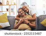 Portrait, hug and senior couple on sofa for bonding, healthy marriage and relationship in living room. Retirement, love and happy man and woman on couch embrace for trust, commitment and care at home