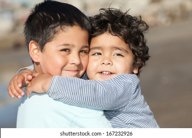 Portrait Of Hugging Little Brothers