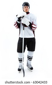 Portrait Of Ice-hockey Player With Hockey Stick