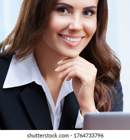 Portrait Image Of Happy Smiling Attractive Businesswoman In Black Confident Style Suit Working With Laptop Computer At Office. Success In Business, Job And Education Concept. Square. Zoom Conference.