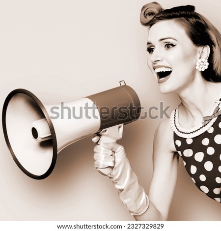 Portrait image of yelling woman holding mega phone, shout advertising promo offer. Girl in wear pin up style dress with megaphone loudspeaker. Brown toned black and white bw monochrome photo