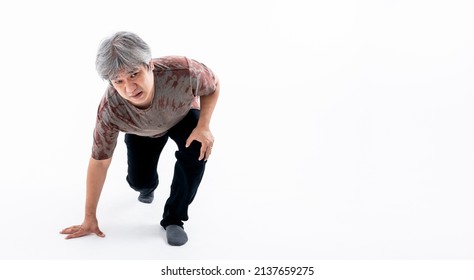 Portrait Images Of Asian Fat Man Has An Ankle Injury, Due To Obesity And Osteoarthritis, On White Background, To Osteoarthritis And Health Care Concept.