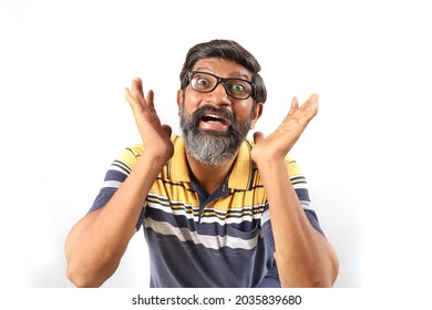 Portrait Of An Indian Bearded Happy And Excited Man Wearing Shirt Excited Face Closeup. Funky Expressions White Background.