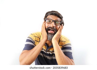 Portrait Of An Indian Bearded Happy And Excited Man Wearing Shirt Excited Face Closeup. Funky Expressions White Background.